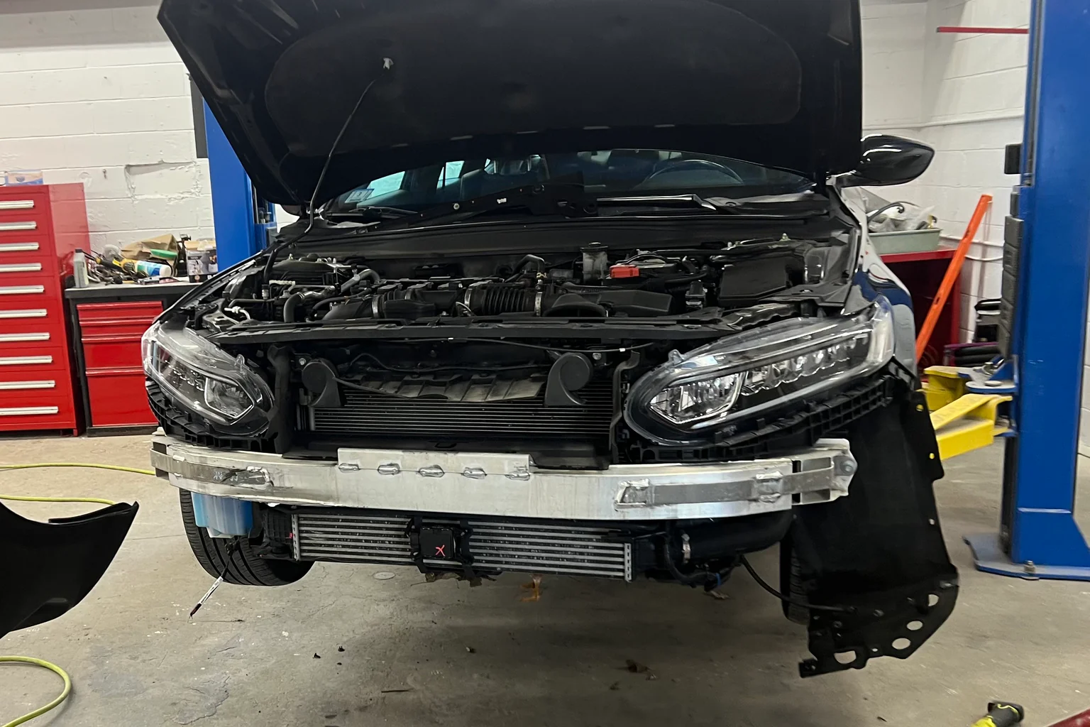 Accident damage bay — full assessment
