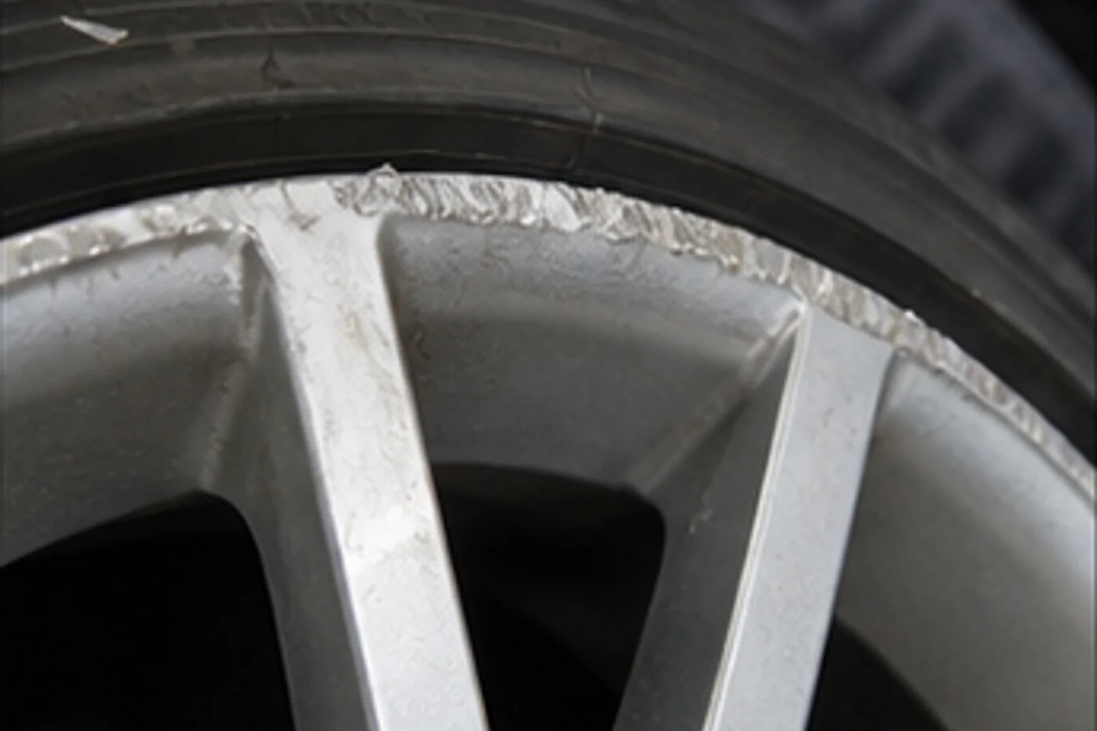Curb rash — wheel face and lip